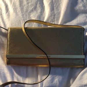 Micheal Kors Gold shoulder bag with long strap